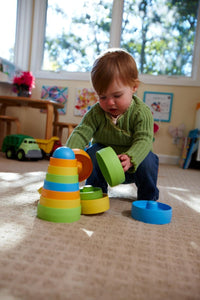 Child playing with Stacker