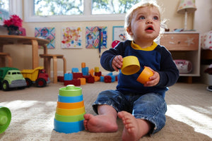 Child playing with Stacker