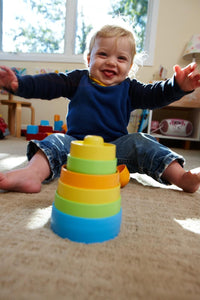 Child playing with Stacker